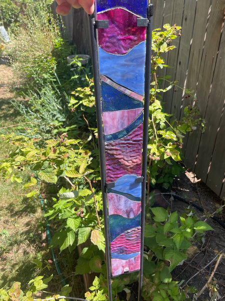 Stained glass garden stake in purple, blue, lavender and green