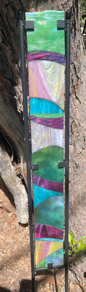 Stained glass garden stake in Monet pink, aqua, green, purple and sunset