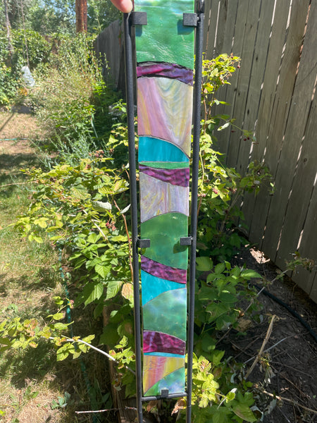 Stained glass garden stake in Monet pink, aqua, green, purple and sunset