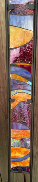 Stained glass garden stake in sunset orange, cranberry, lavender, periwinkle