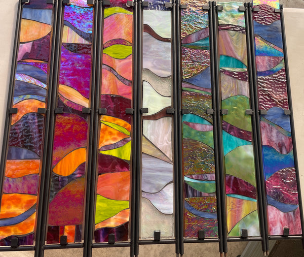 Stained glass garden stake in Monet pink, aqua, green, purple and sunset